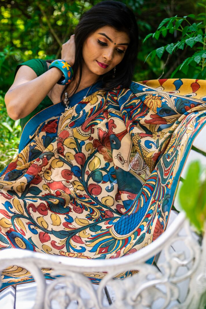 Georgeous Hand Painted Signature Kalamkari With Floral  Design And Peacock In Pallu
