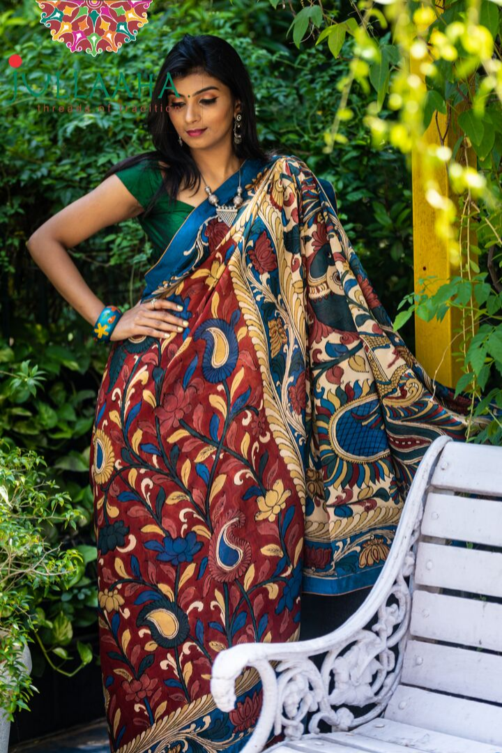 Georgeous Hand Painted Signature Kalamkari With Floral  Design And Peacock In Pallu