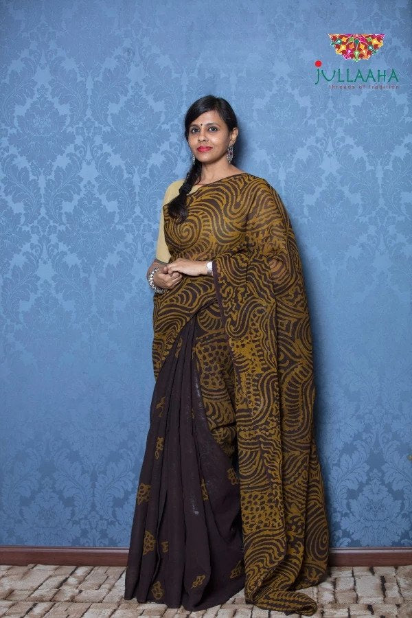 Exquisite Brown Hand Painted Batik on Georgette -to bring out the timeless look in you
